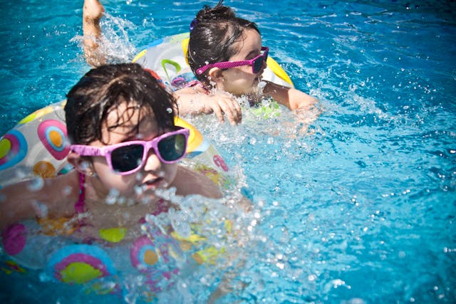 pexels-jsalamanca-61129 kids-playing-in-a-pool